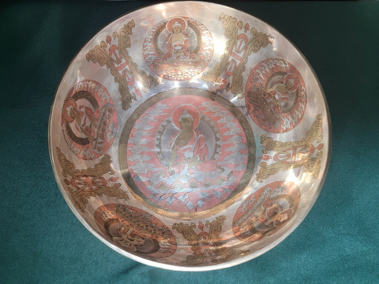 Timmur 9-inch diameter Vairochana with 8 Auspicious Signs and Om mantra Engraved Handmade Singing Bowl